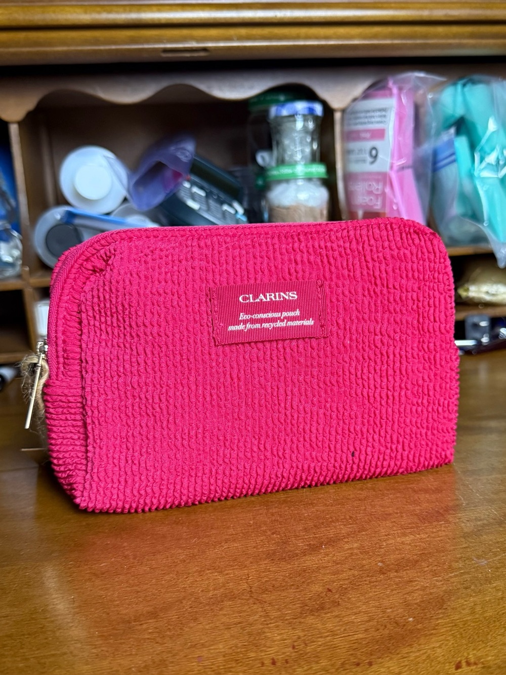Clarins Hydra-Essentiel Skincare Set with Red Textured Cosmetic Pouch